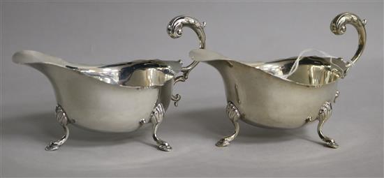 A pair of 1930s silver sauceboats with flying scroll handles, Birmingham, 1937, 4.5 oz.